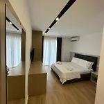 Suite Hotel Отель Шенджин