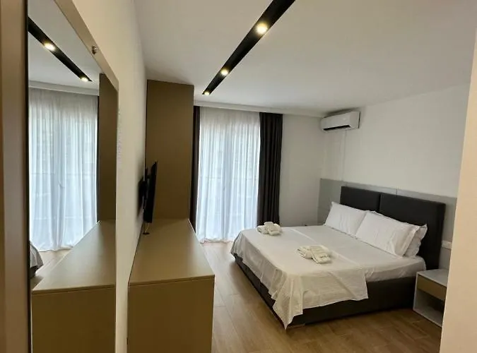 Suite Hotel Отель Шенджин