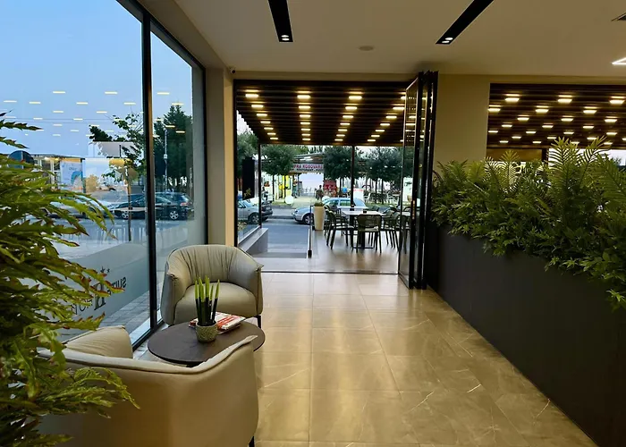 Suite Hotel Отель Шенджин